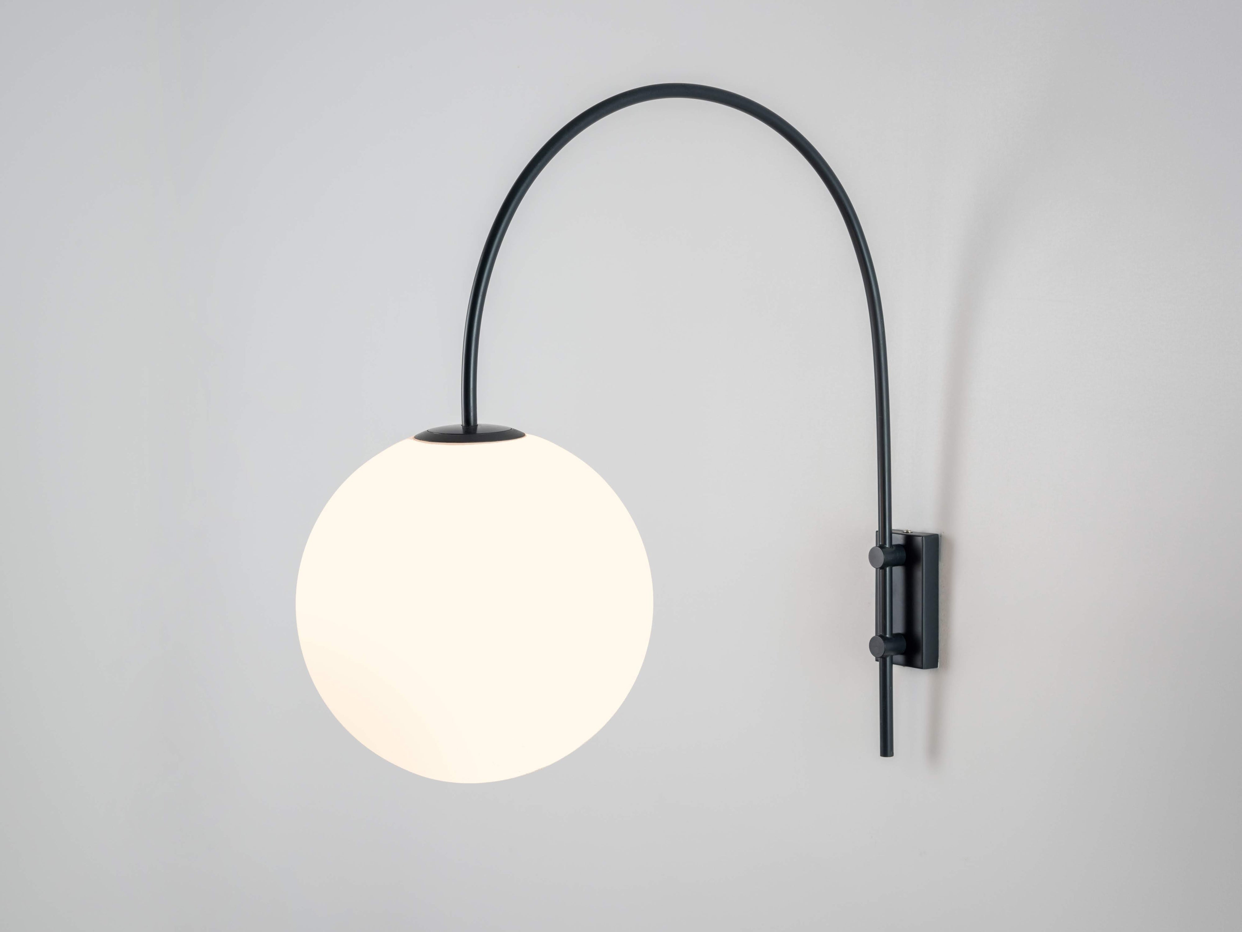 Curved sales wall light
