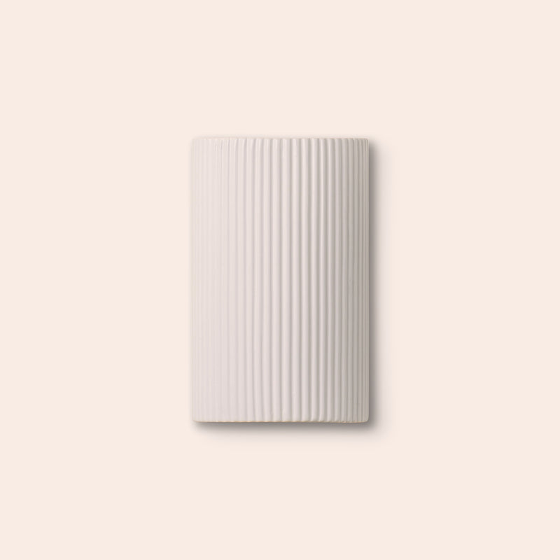 White ribbed ceramic wall light