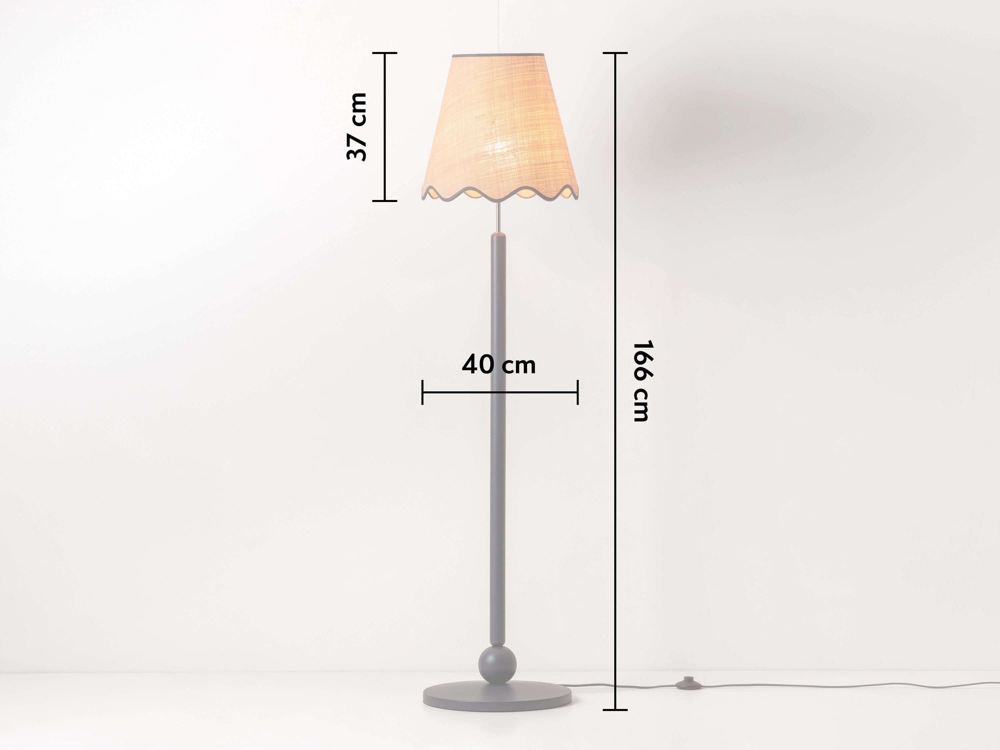 Charcoal grey turned wood floor lamp