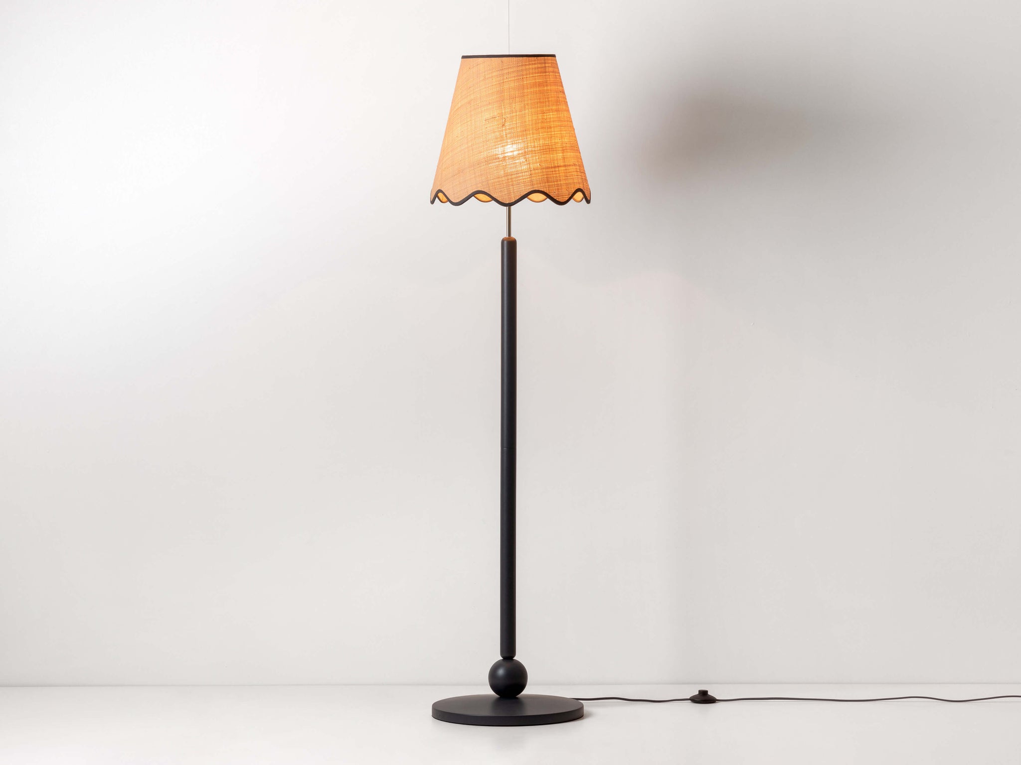 Charcoal grey turned wood floor lamp